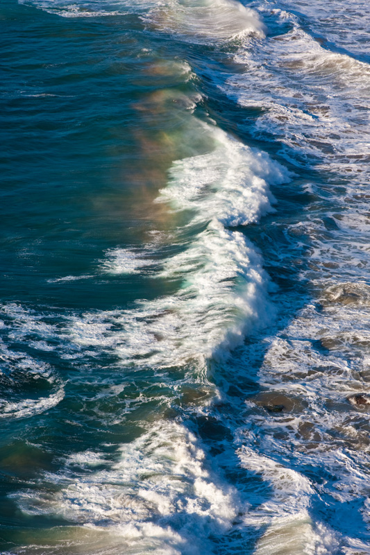 Rainbow In Mist From Waves